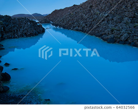 Lava rock and thermal water at the Blue Lagoon 64032566