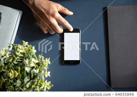 Close up of male using modern smartphone touchscreen Close up of male using modern smartphone touchscreen 64033849