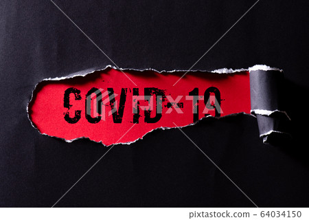 Top view of Black torn paper and the text COVID-19 Top view of Black torn paper and the text COVID-19 64034150