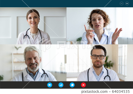 Doctors engaged in distant communication by videocall computer screen view Doctors engaged in distant communication by videocall computer screen view 64034535
