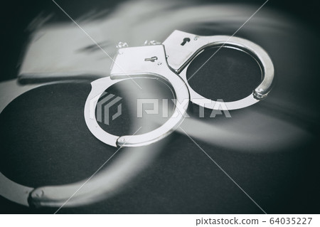 Pair of metal handcuffs Pair of metal handcuffs 64035227