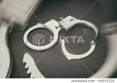 Pair of metal handcuffs Pair of metal handcuffs 64035228