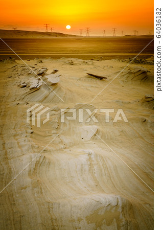 Alwathba Fossil Dunes at sunset Alwathba Fossil Dunes at sunset 64036182