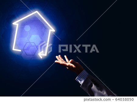 Conceptual image with hand pointing at house or main page icon on dark background Conceptual image with hand pointing at house or main page icon on dark background 64038050