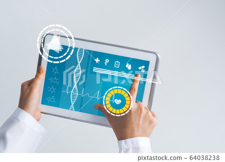 Close of female doctor hands working with tablet pc computer 64038238
