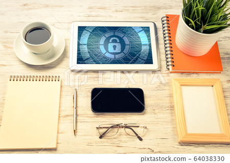 Web security and technology concept with tablet pc on wooden tab Web security and technology concept with tablet pc on wooden tab 64038330