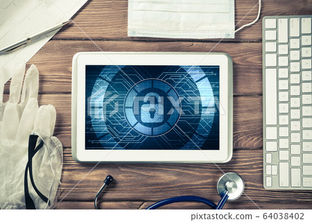 Web security and technology concept with tablet pc on wooden tab 64038402