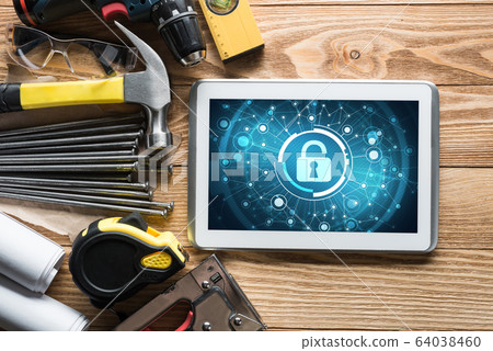 Web security and technology concept with tablet pc on wooden table Web security and technology concept with tablet pc on wooden table 64038460