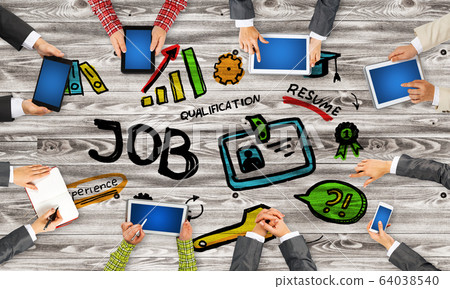 Top view of businesspeople sitting at table and using gadgets 64038540