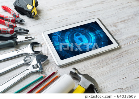 Web security and technology concept with tablet pc on wooden table Web security and technology concept with tablet pc on wooden table 64038609