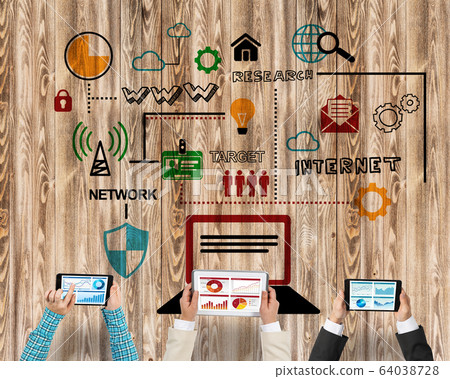 Top view of businesspeople sitting at table and using gadgets Top view of businesspeople sitting at table and using gadgets 64038728