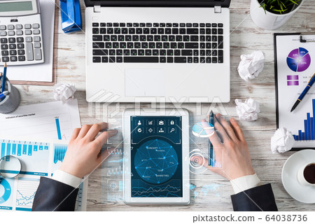 Businessman working at financial reports Businessman working at financial reports 64038736
