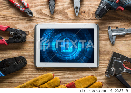 Web security and technology concept with tablet pc on wooden table Web security and technology concept with tablet pc on wooden table 64038749