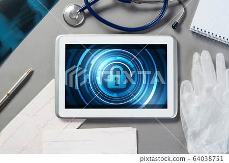 Web security and technology concept with tablet pc on table 64038751