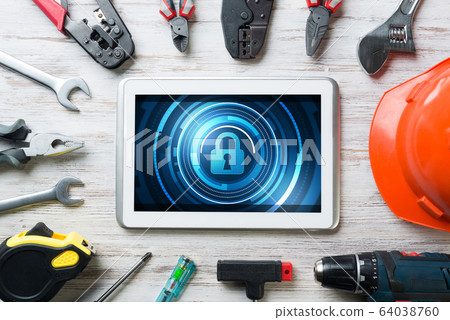 Web security and technology concept with tablet pc on wooden table Web security and technology concept with tablet pc on wooden table 64038760