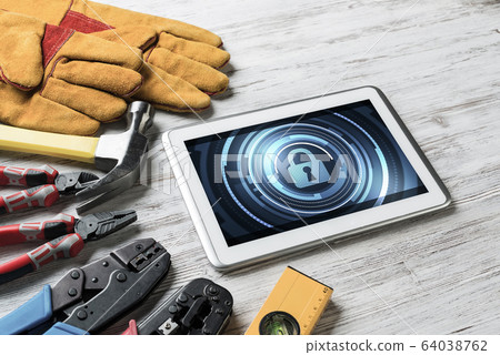 Web security and technology concept with tablet pc on wooden tab Web security and technology concept with tablet pc on wooden tab 64038762