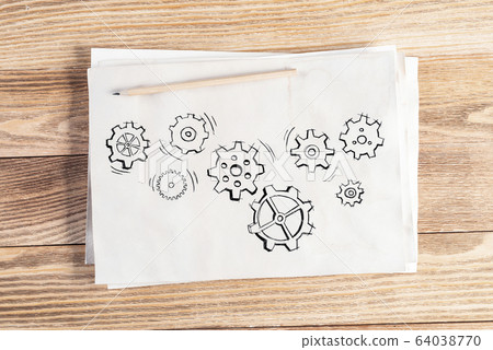 Group of rotating gears pencil hand drawn Group of rotating gears pencil hand drawn 64038770
