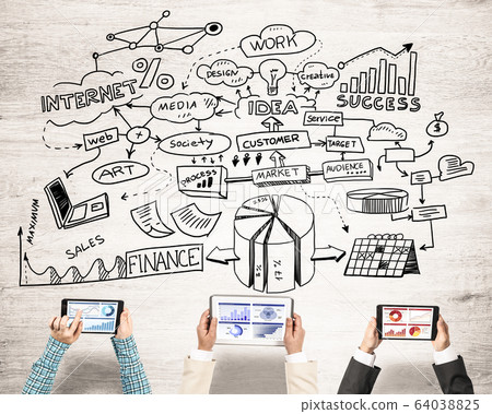 Top view of businesspeople sitting at table and using gadgets Top view of businesspeople sitting at table and using gadgets 64038825