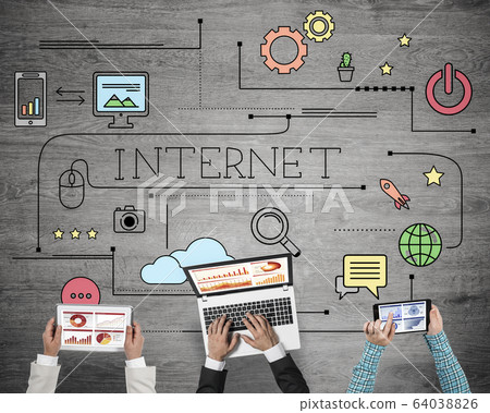 Top view of businesspeople sitting at table and using gadgets Top view of businesspeople sitting at table and using gadgets 64038826