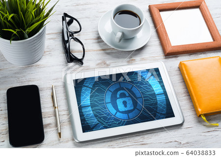 Web security and technology concept with tablet pc on wooden table Web security and technology concept with tablet pc on wooden table 64038833