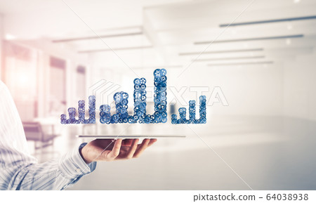 Close of businessman holding tablet pc with progressing graph ic 64038938