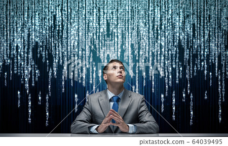 Handsome man folded hands and having serious face 64039495