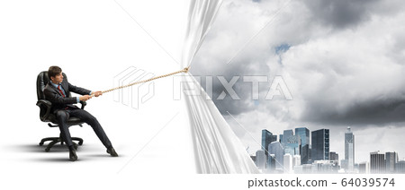 Young man opening white curtain and presenting modern city landscape Young man opening white curtain and presenting modern city landscape 64039574