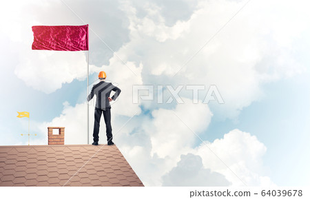 Young businessman with flag presenting concept of leadership. Mi Young businessman with flag presenting concept of leadership. Mi 64039678