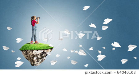 Concept of careless happy childhood with girl looking in binoculars Concept of careless happy childhood with girl looking in binoculars 64040108