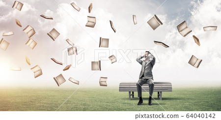Young man in suit in park dont want to hear anything Young man in suit in park dont want to hear anything 64040142