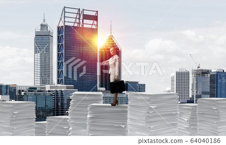 Successful confident business woman in suit. Successful confident business woman in suit. 64040186