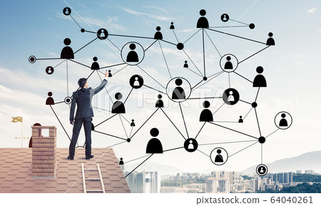 Businessman on house roof presenting networking and connection c Businessman on house roof presenting networking and connection c 64040261