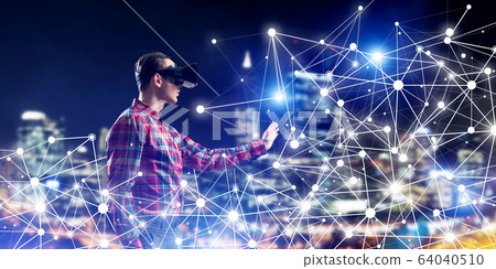 Guy wearing checked shirt and virtual mask reaching hand to feel his way Guy wearing checked shirt and virtual mask reaching hand to feel his way 64040510
