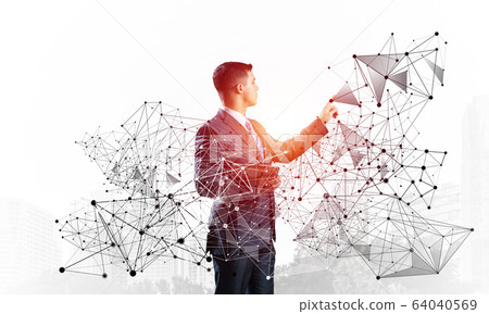 Business person pointing on abstract network Business person pointing on abstract network 64040569