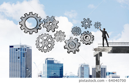 Businessman drawing teamwork conceptual scheme. 64040700