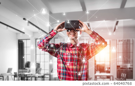Guy wearing checked shirt and virtual mask demonstrating some emotions Guy wearing checked shirt and virtual mask demonstrating some emotions 64040768