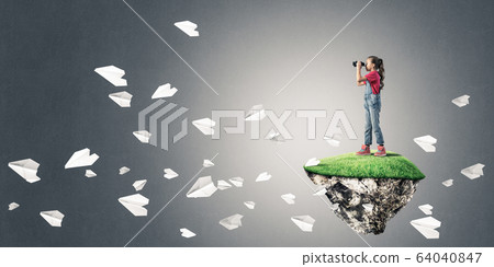 Concept of careless happy childhood with girl looking in binocul Concept of careless happy childhood with girl looking in binocul 64040847