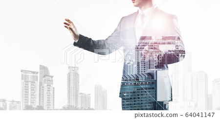Standing entrepreneur in business suit Standing entrepreneur in business suit 64041147