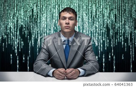 Handsome man folded hands and having serious face Handsome man folded hands and having serious face 64041363