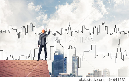 Man architect draw silhouette of modern city on blue sky. Mixed 64041381