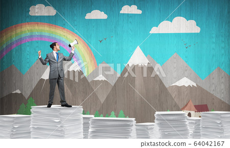 Businessman standing with megaphone. Businessman standing with megaphone. 64042167