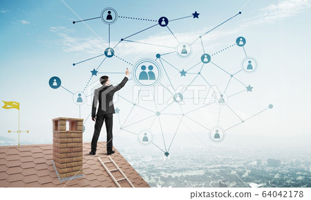 Businessman on house roof presenting networking and connection concept. Mixed media Businessman on house roof presenting networking and connection concept. Mixed media 64042178