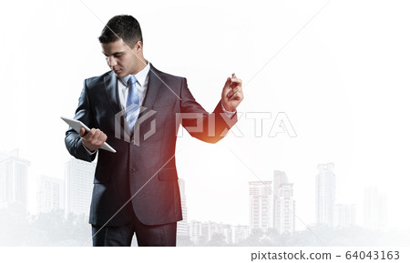Front view of man in business suit and tie Front view of man in business suit and tie 64043163