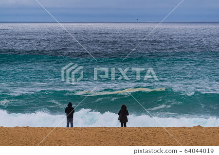 Big wave Nazare Portugal crashing and breaking on the coast of Nazareth, Portugal Big wave Nazare Portugal crashing and breaking on the coast of Nazareth, Portugal 64044019