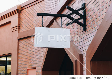 horizontal empty signage on clothes shop front 64045140