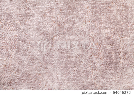 Light beige fluffy background of soft, fleecy cloth. Light beige fluffy background of soft, fleecy cloth. 64046273