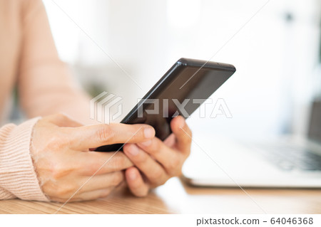 using smart phone 64046368