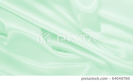 Smooth elegant green silk or satin luxury cloth Smooth elegant green silk or satin luxury cloth 64049760