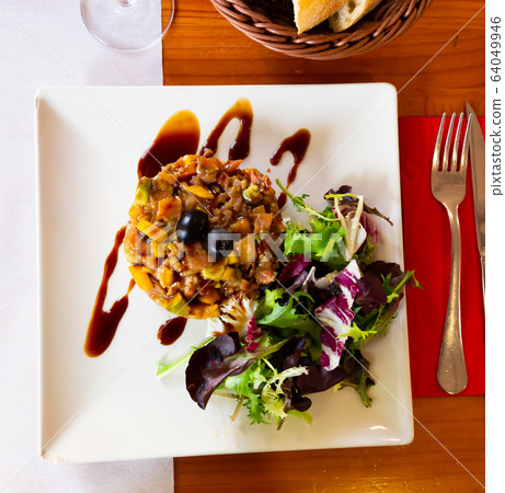 Tasty smoked salmon tartare with mango and avocado Tasty smoked salmon tartare with mango and avocado 64049946