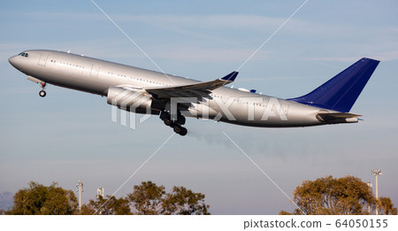 Passenger airplane flying up in sky Passenger airplane flying up in sky 64050155